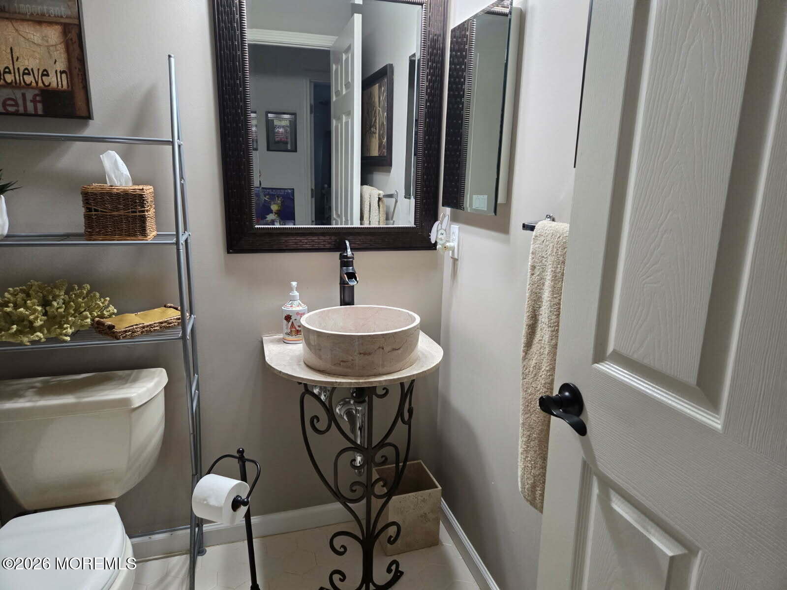 3276 Springer Lane Toms River, NJ 08755 - Photo 12 of 29 a bathroom with a toilet sink and mirror