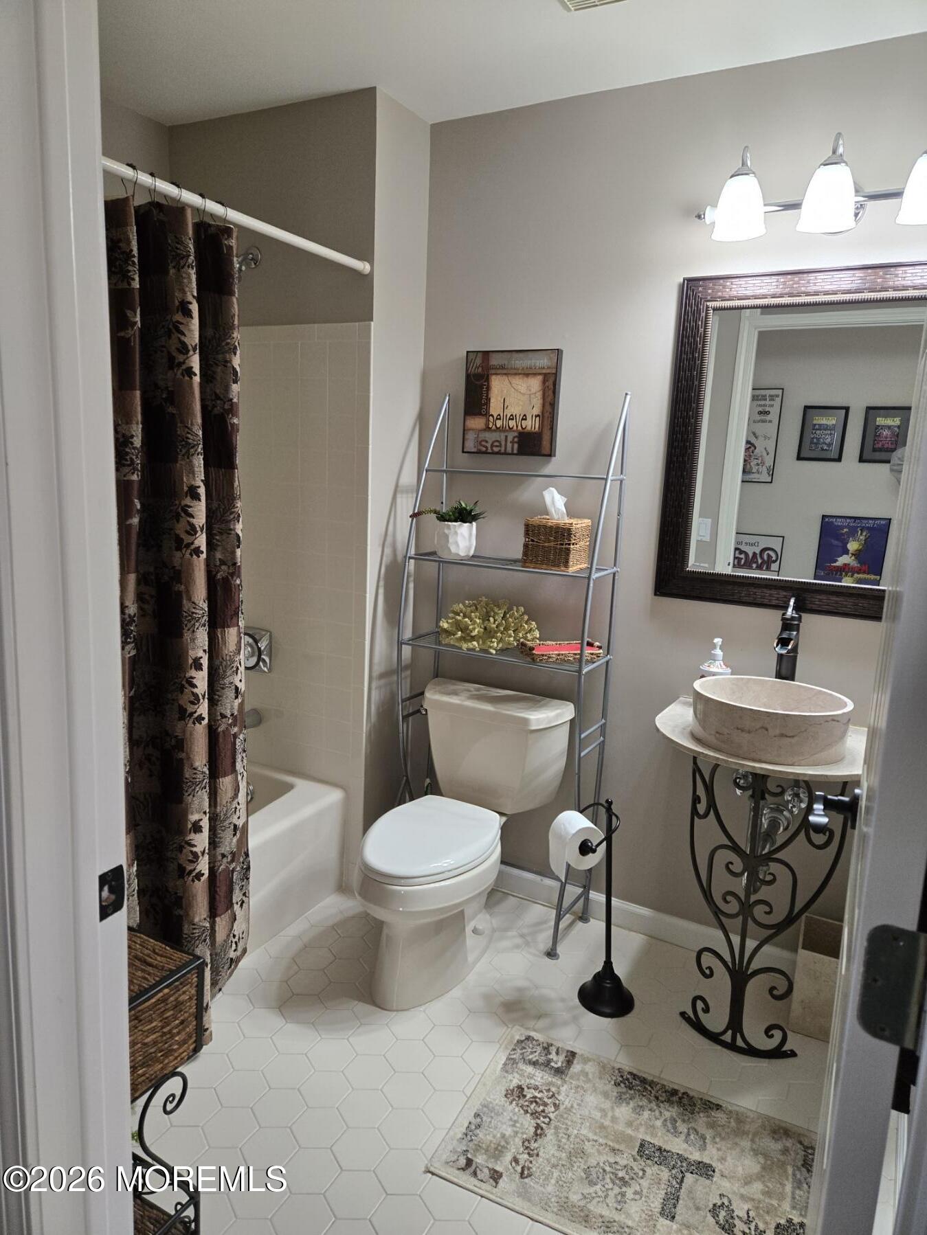 3276 Springer Lane Toms River, NJ 08755 - Photo 13 of 29 a bathroom with a toilet sink and shower