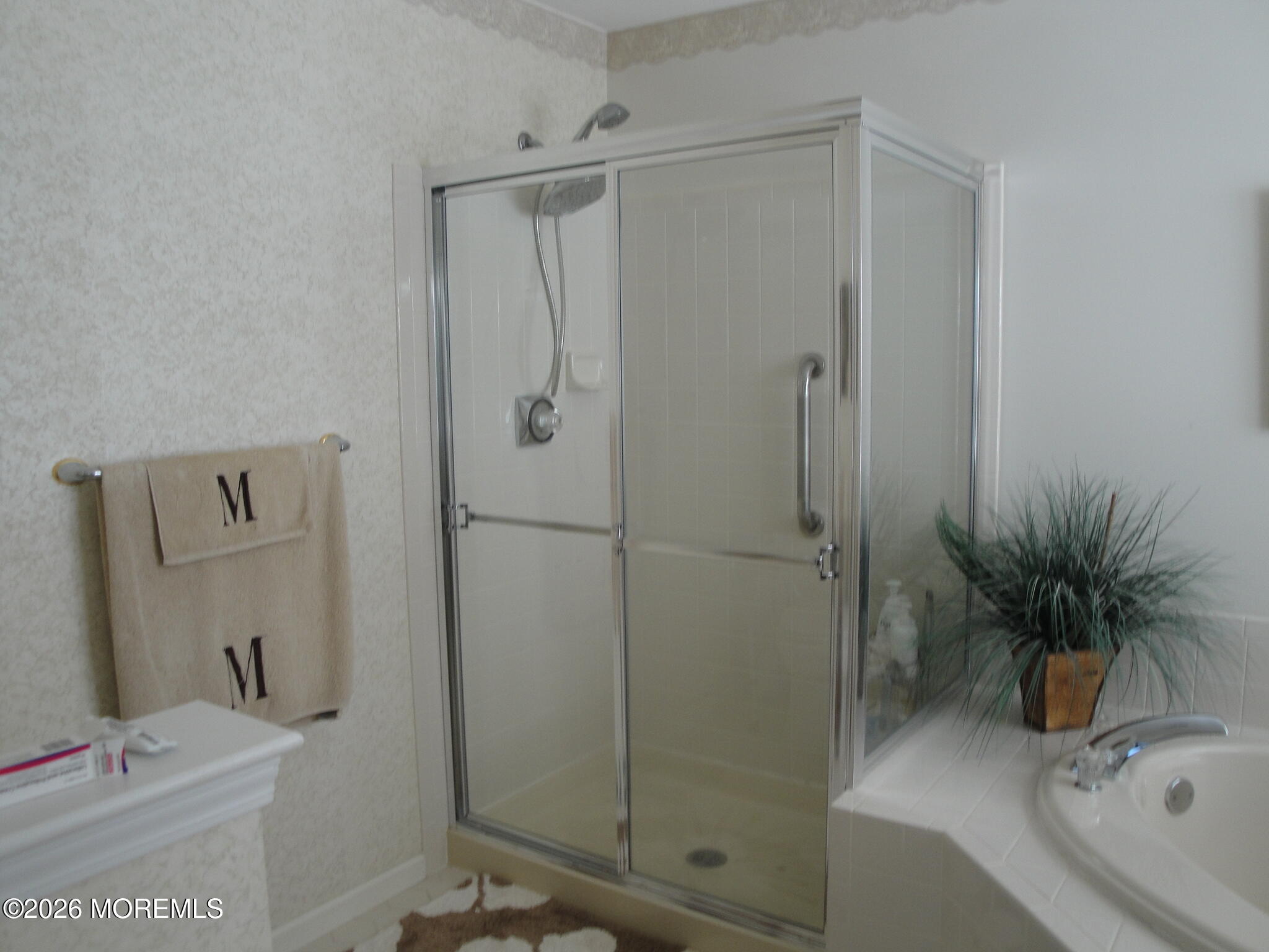 3276 Springer Lane Toms River, NJ 08755 - Photo 18 of 29 a bathroom with a tub shower and a sink