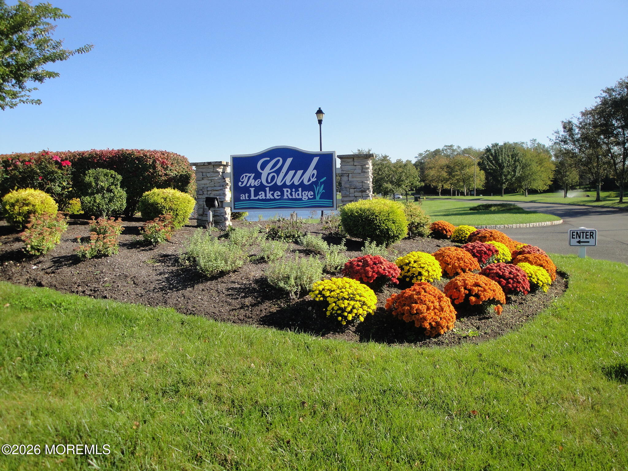 3276 Springer Lane Toms River, NJ 08755 - Photo 20 of 29 a view of a backyard with plants and outdoor seating