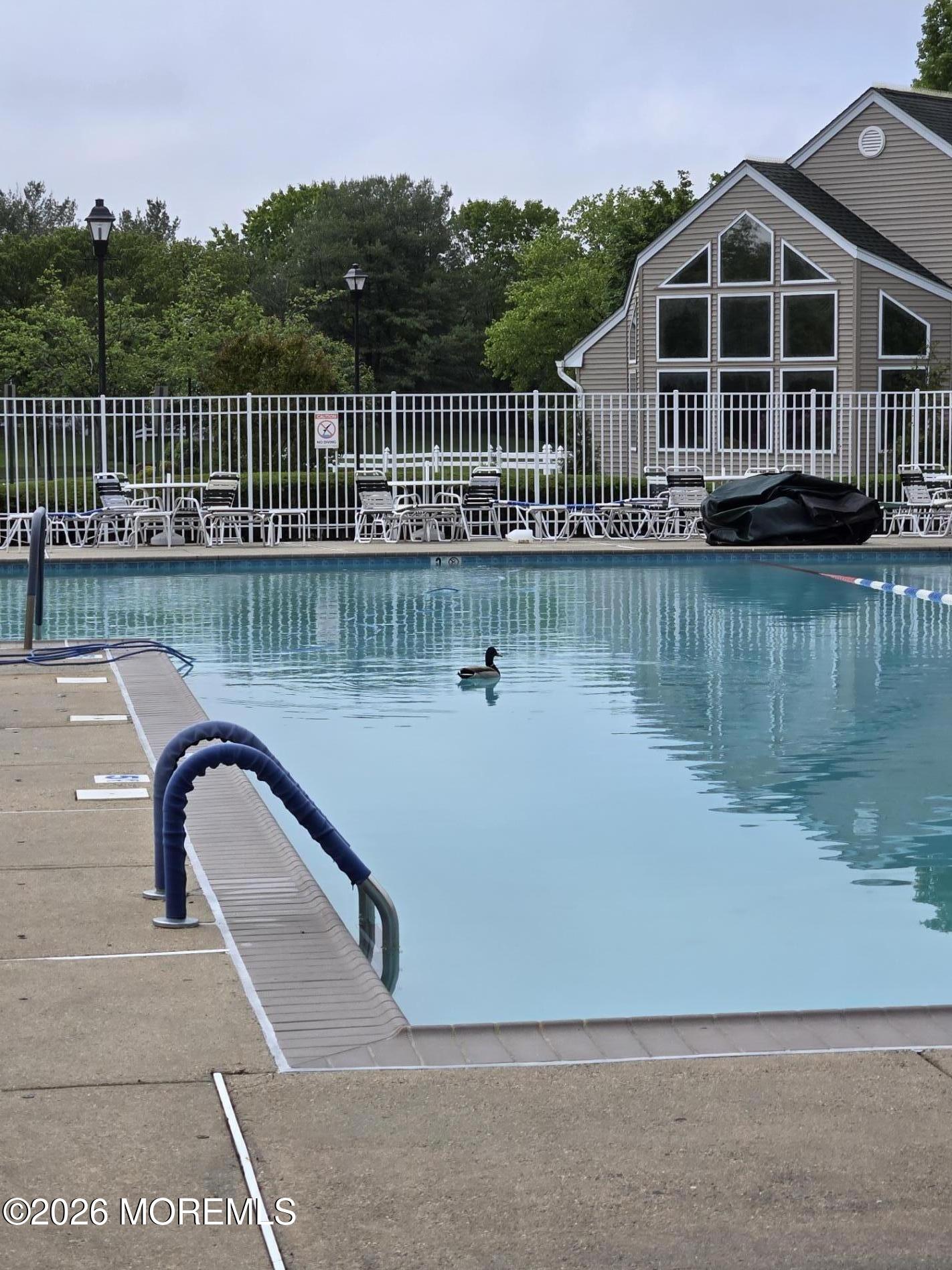 3276 Springer Lane Toms River, NJ 08755 - Photo 27 of 29 a view of a wooden deck with a lake