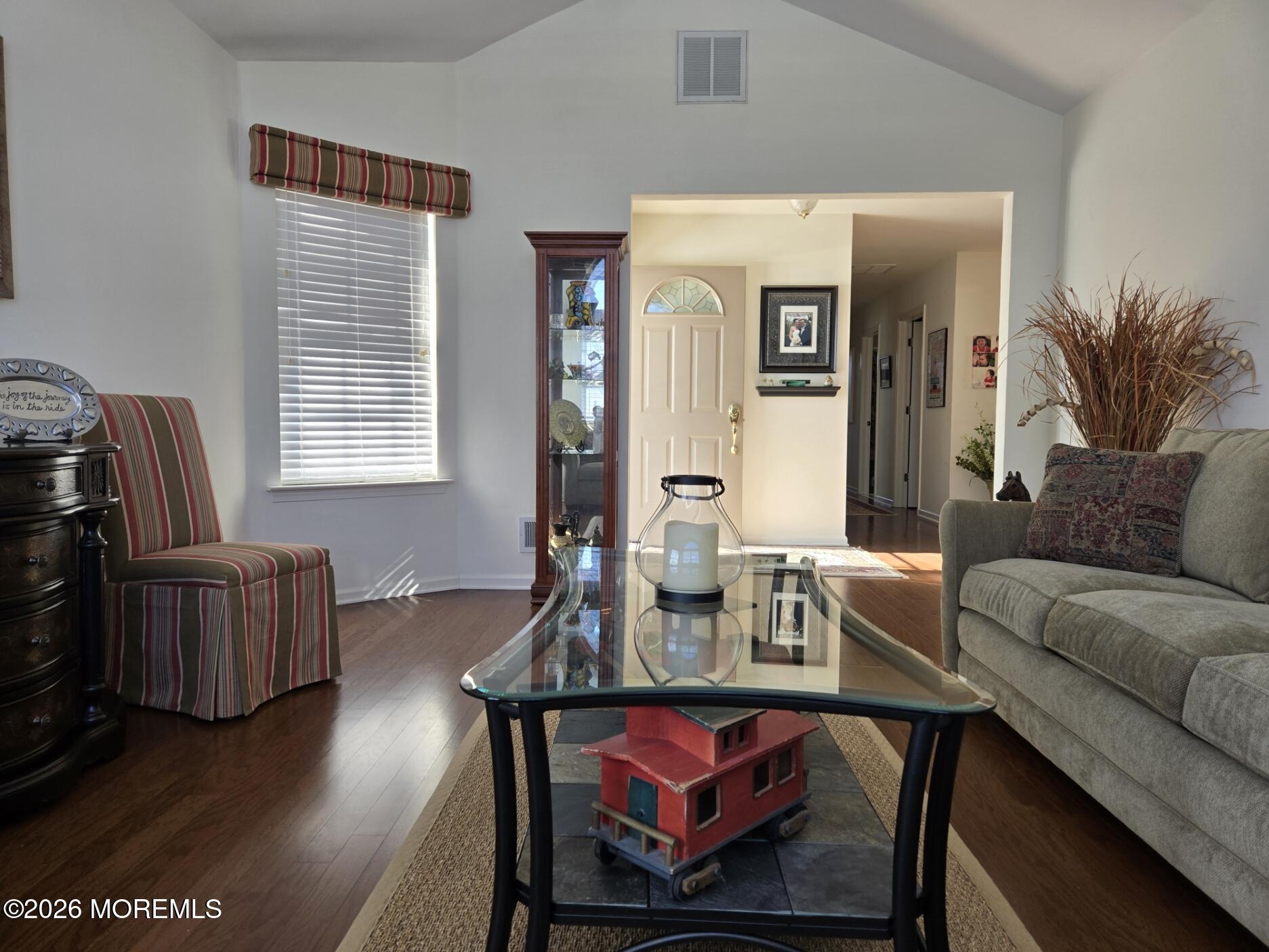 3276 Springer Lane Toms River, NJ 08755 - Photo 5 of 29 a living room with furniture a wooden floor and a piano