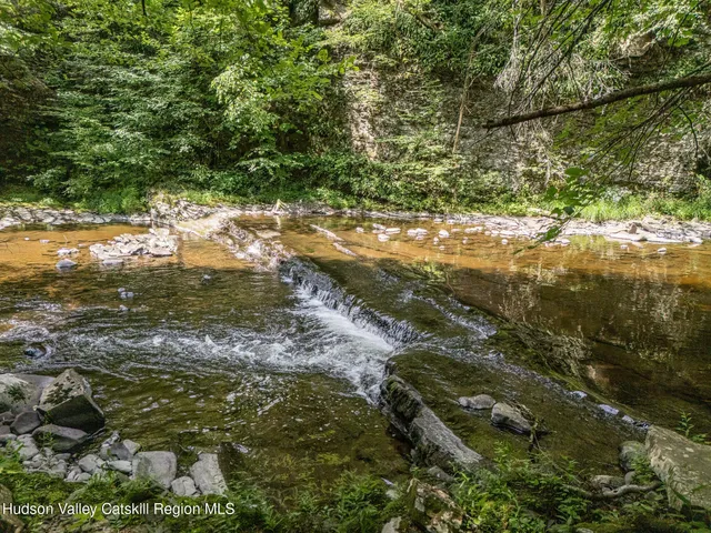 a view of a lake from a yard