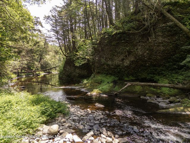 a view of a lake from a balcony