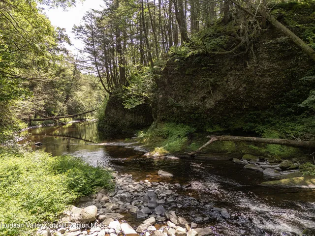 a view of a lake from a balcony