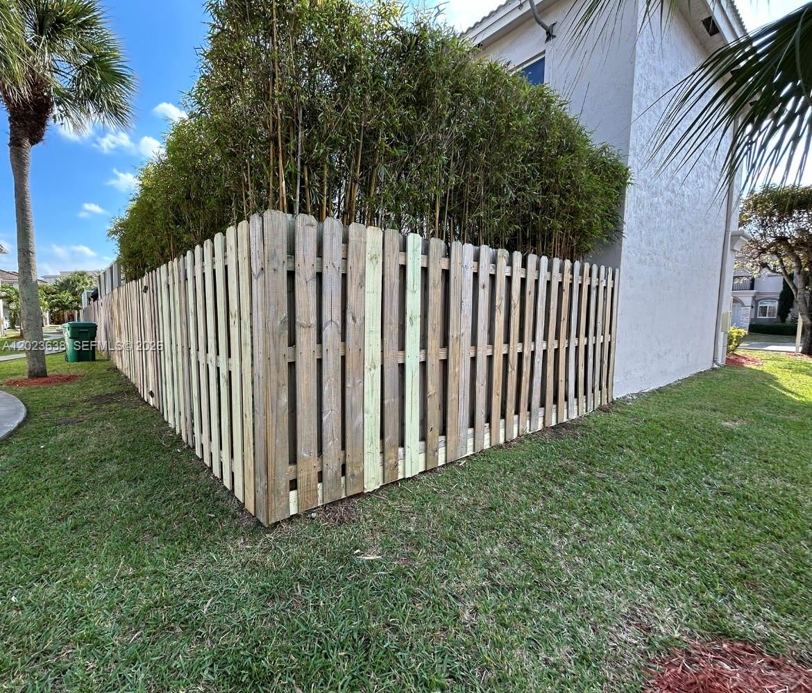 8351 Southwest 124th Avenue, Unit 101 Miami, FL 33183 - Photo 4 of 43 Corner unit fence