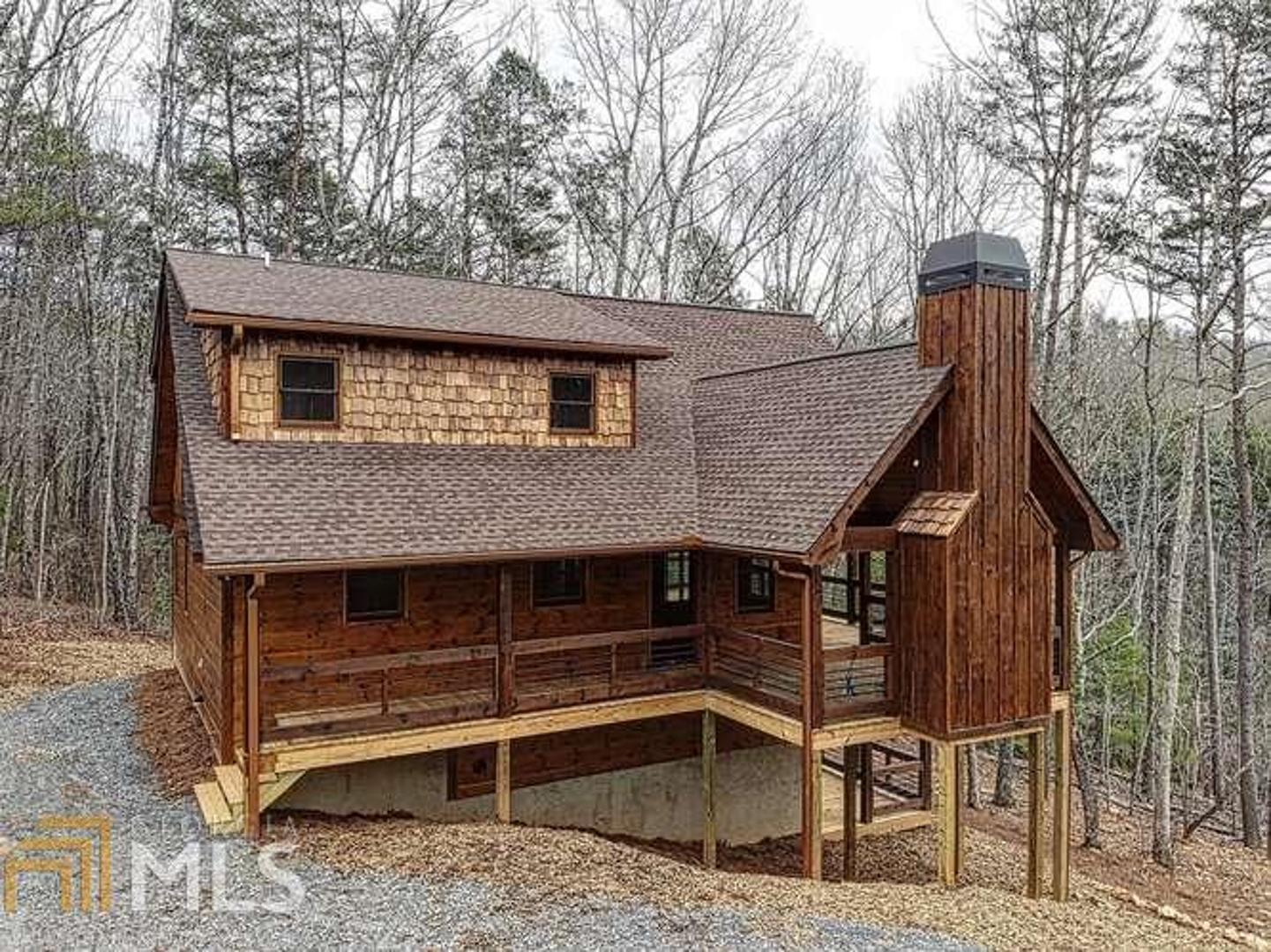0 Sugar Mountain Road Blue Ridge, GA 30513 - Photo 1 of 1 a view of house with backyard space and seating