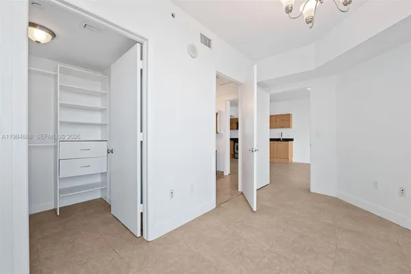 a view of a tall white building