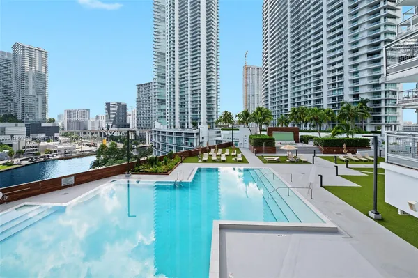 a view of a house with a swimming pool