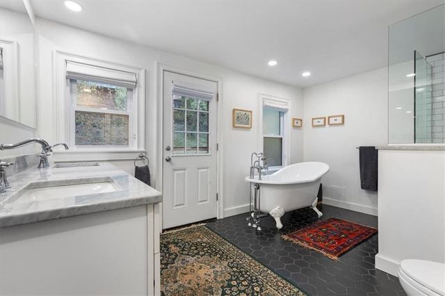 a room with a table and chairs