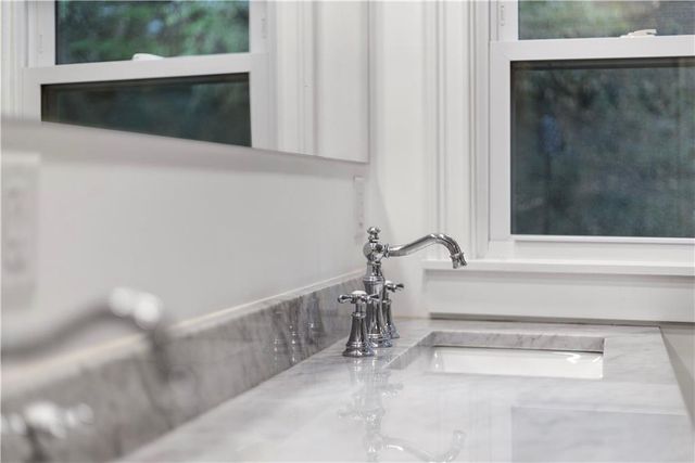 a view of a chairs and table on the deck