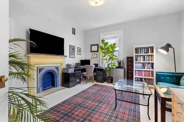 a view of a fireplace with a sink