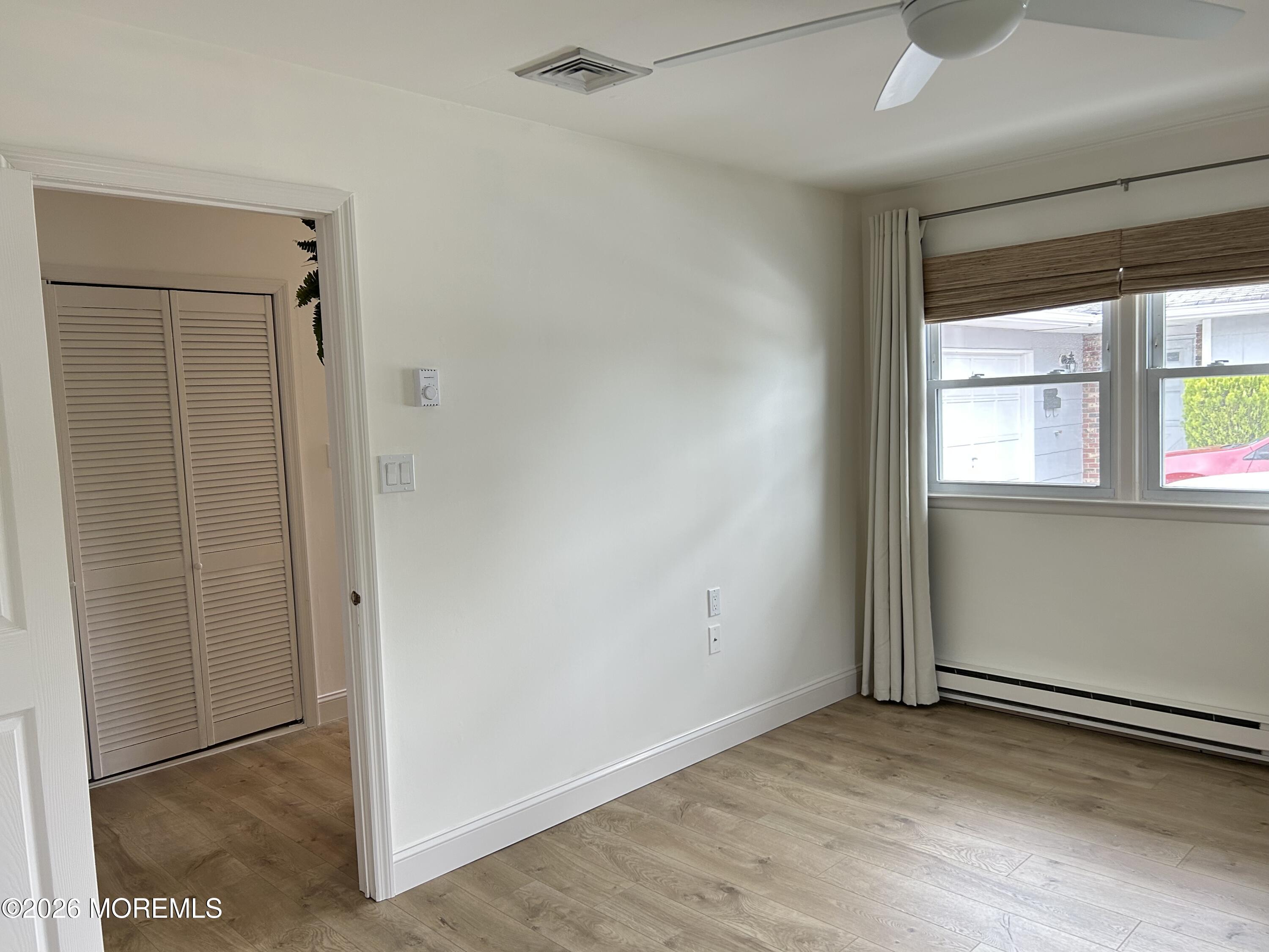 6 Patmore Road Brick, NJ 08724 - Photo 21 of 23 an empty room with windows