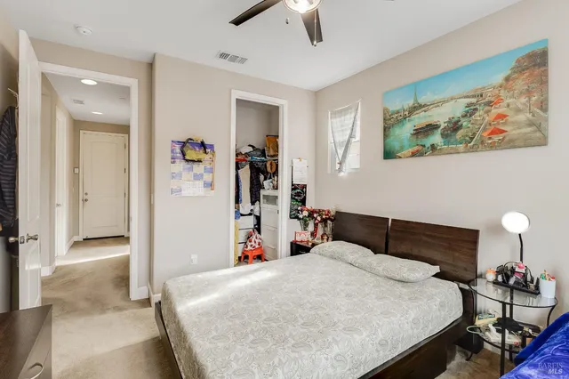 a bathroom with a sink double vanity and a mirror