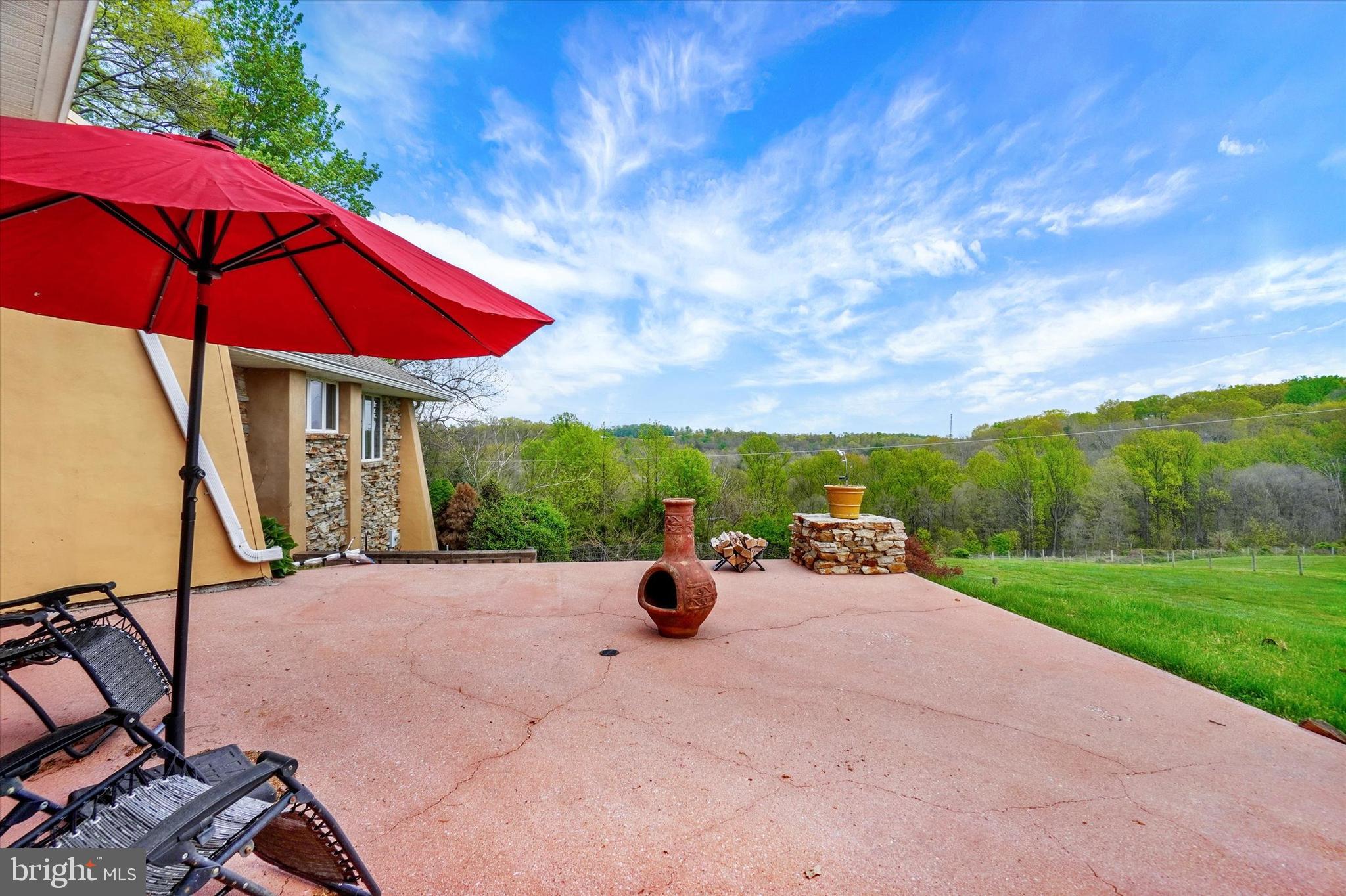 8272 Woodbine Road Airville, PA 17302 - Photo 3 of 53 a view of a backyard with sitting area