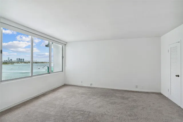 an empty room with window