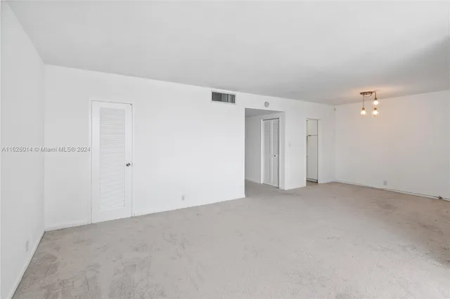 an empty room with an entryway