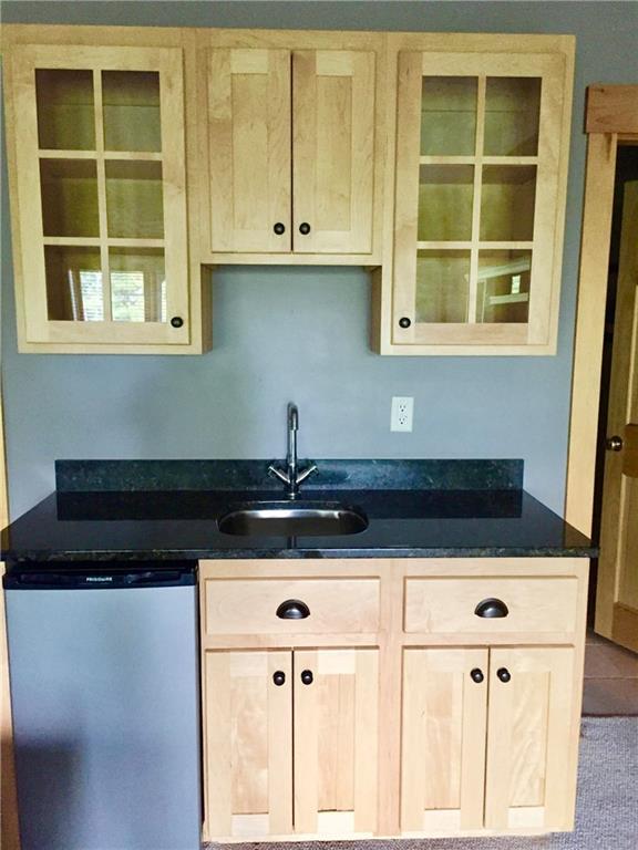 7002 Hardwood Ridge Road, Unit 7002 Kingfield, ME 04947 - Photo 20 of 22 Wet bar for entertaining.