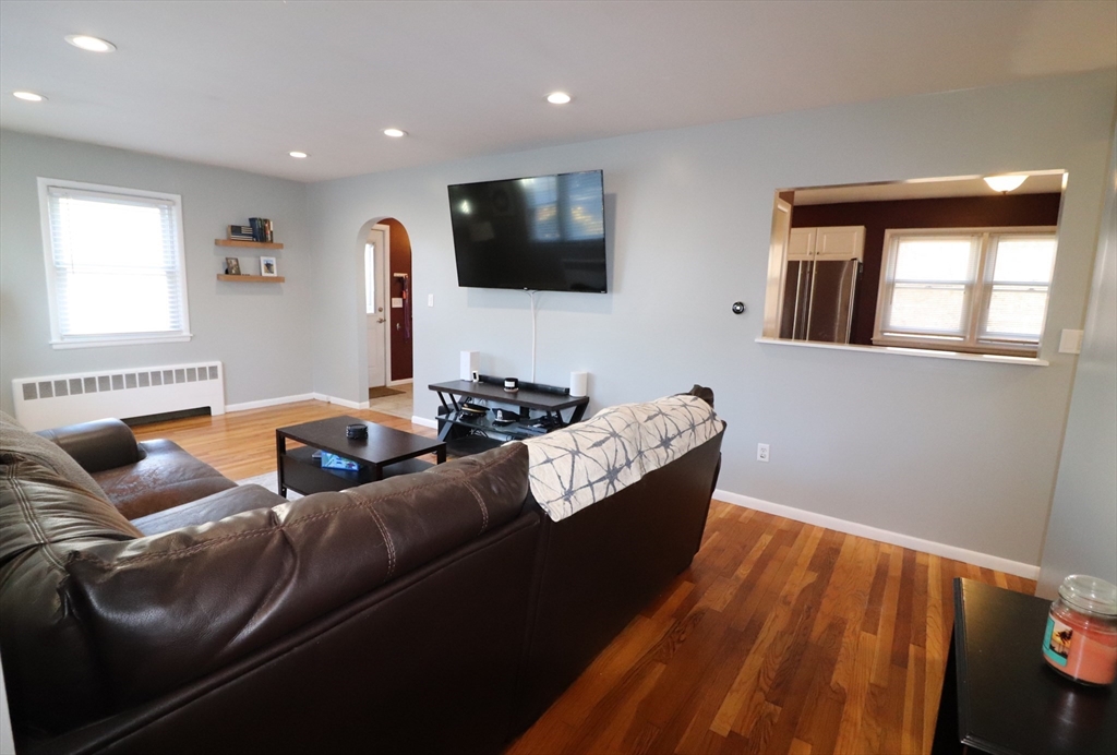 36 Stony Brook Road Raynham, MA 02767 - Photo 17 of 30 a living room with furniture and a flat screen tv