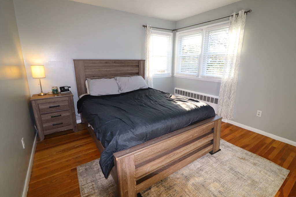 36 Stony Brook Road Raynham, MA 02767 - Photo 24 of 30 a bedroom with a bed and window