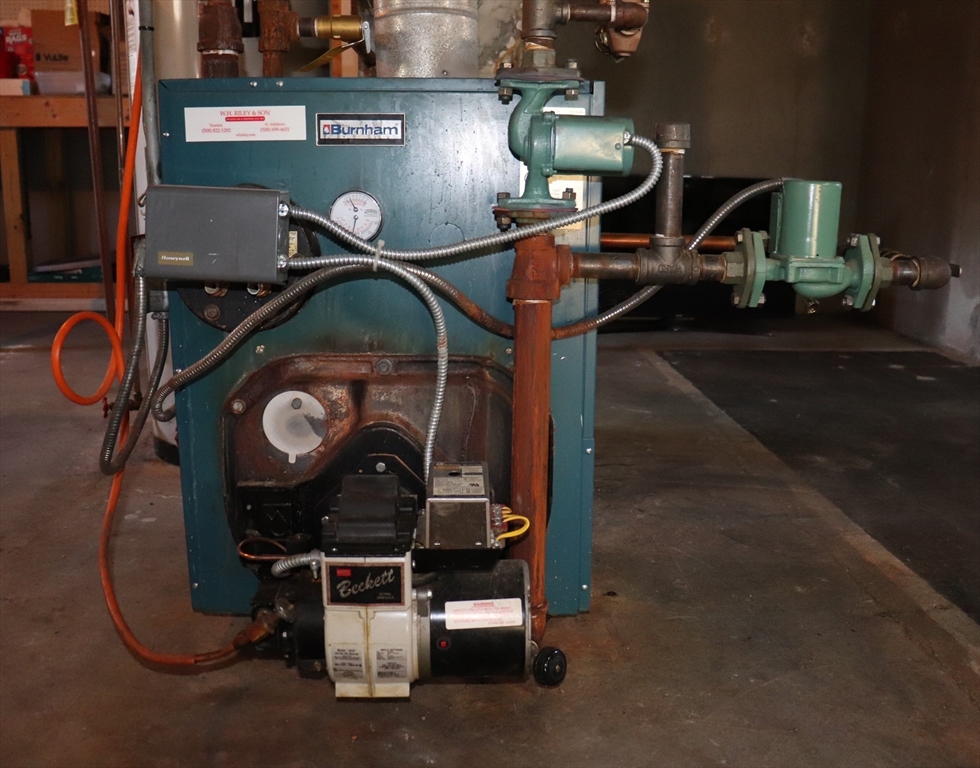 36 Stony Brook Road Raynham, MA 02767 - Photo 28 of 30 a utility room with dryer and washer