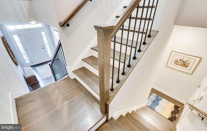 1983 Roland Clarke Place Reston, VA 20191 - Photo 6 of 44 Double staircase from front door and garage