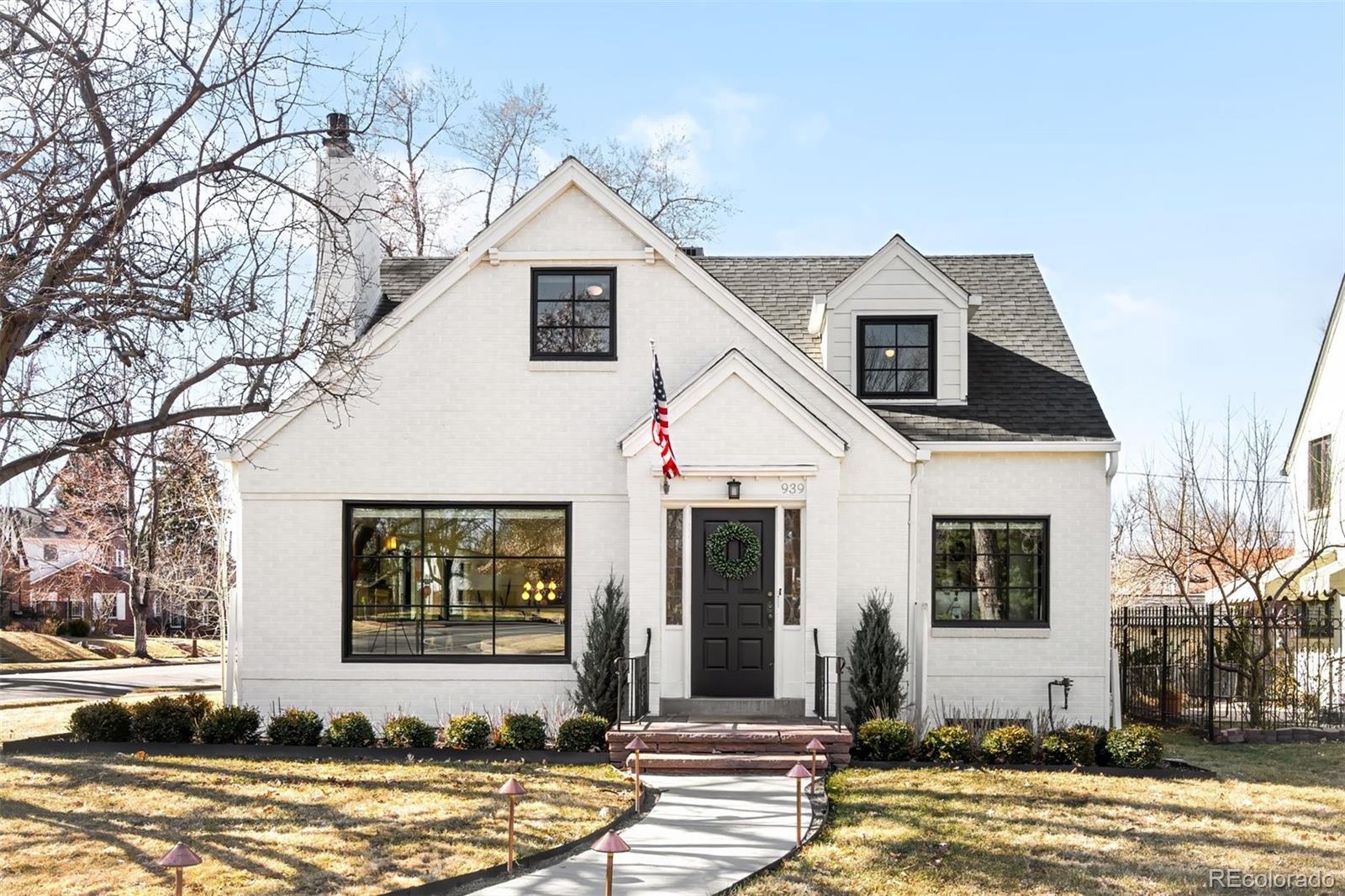 939 South Ellipse Way Denver, CO 80209 - Photo 1 of 1 a front view of a house with a yard