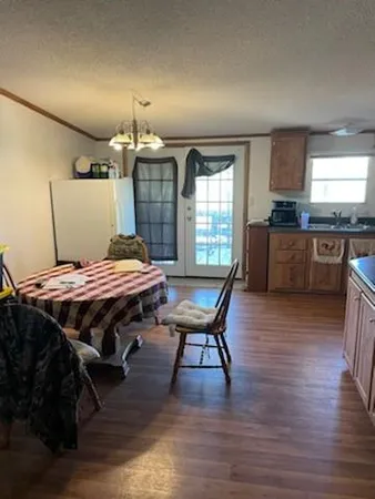 a kitchen with granite countertop lots of counter top space