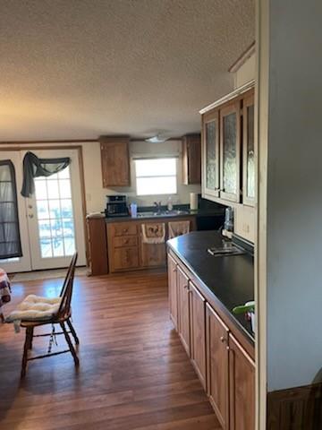1001 Elizabeth Coleman, TX 76834 - Photo 18 of 32 a kitchen with granite countertop lots of counter top space