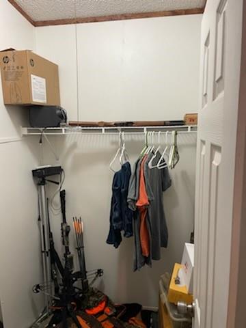 1001 Elizabeth Coleman, TX 76834 - Photo 23 of 32 a view of walk in closet with clothes and shoes