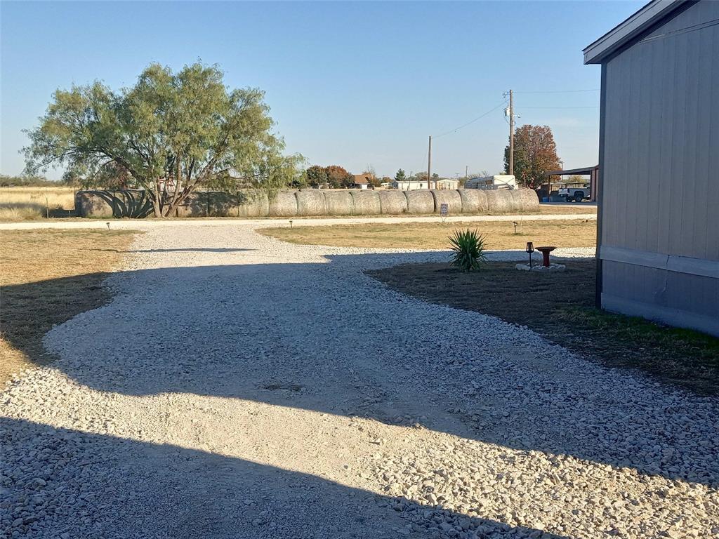 1001 Elizabeth Coleman, TX 76834 - Photo 8 of 32 a view of a lake and yard
