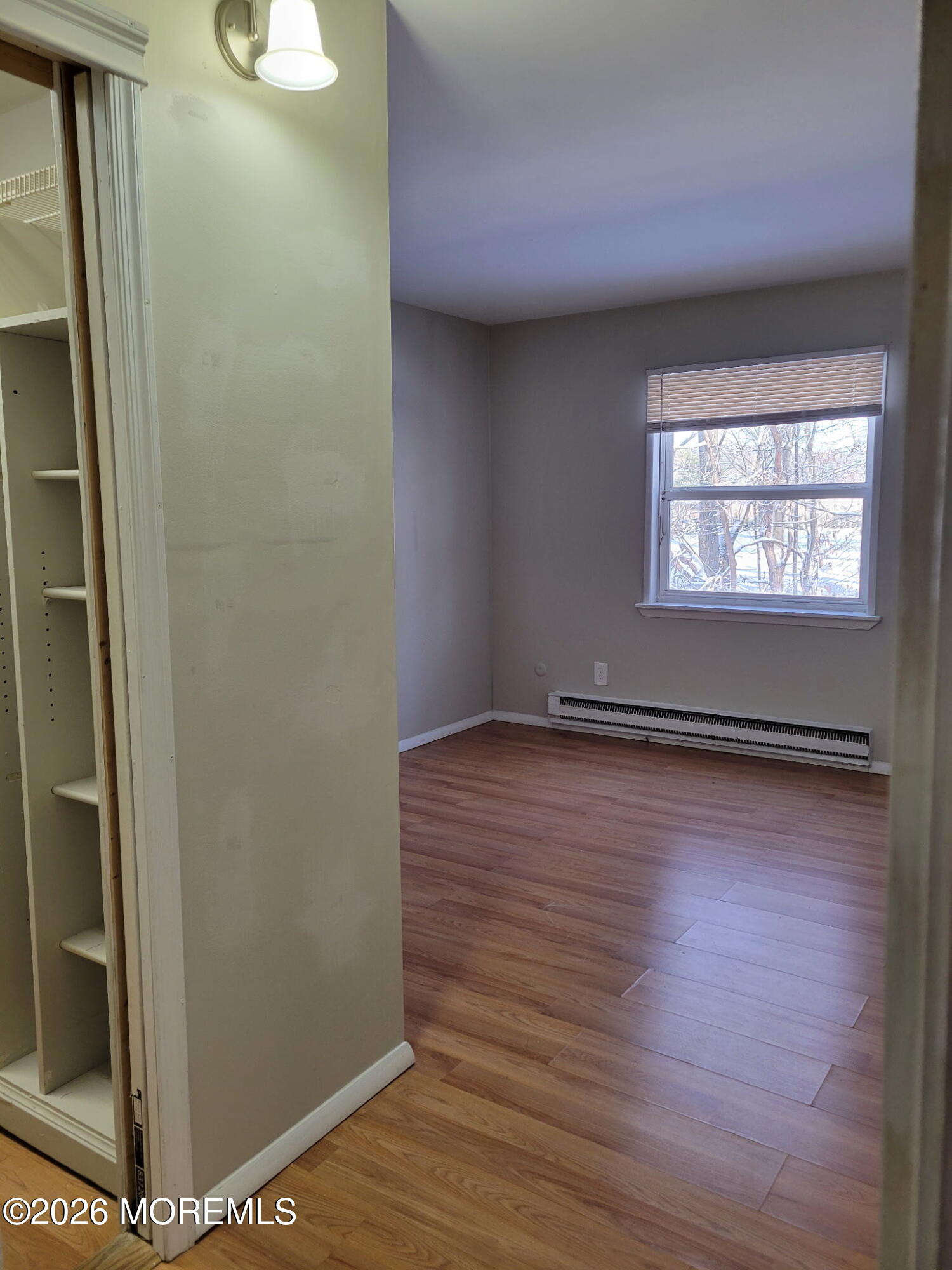 400 Matawan Avenue, Unit 57B Cliffwood, NJ 07721 - Photo 7 of 7 a view of room with window and wooden floor