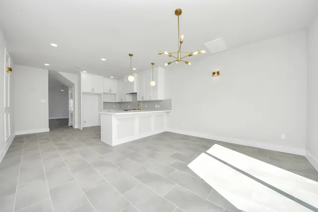 a view of a kitchen with a sink