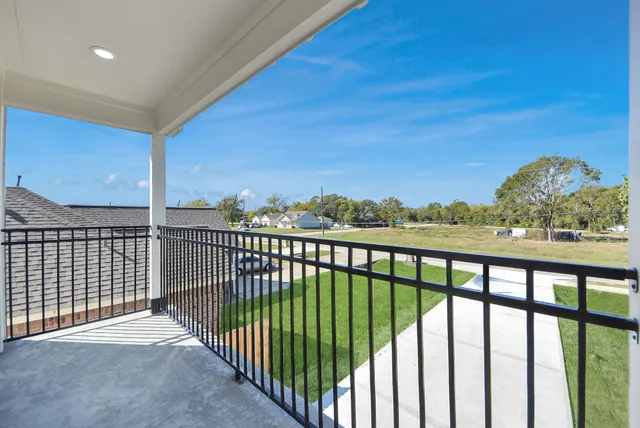 a view of a balcony with an outdoor space