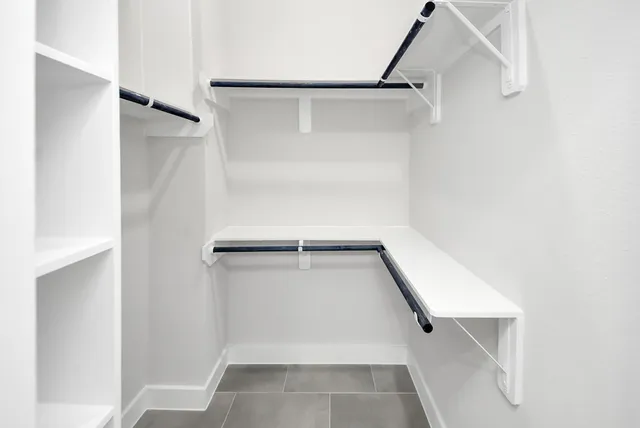 a view of an house with backyard and garden