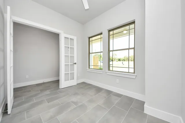 an empty room with windows