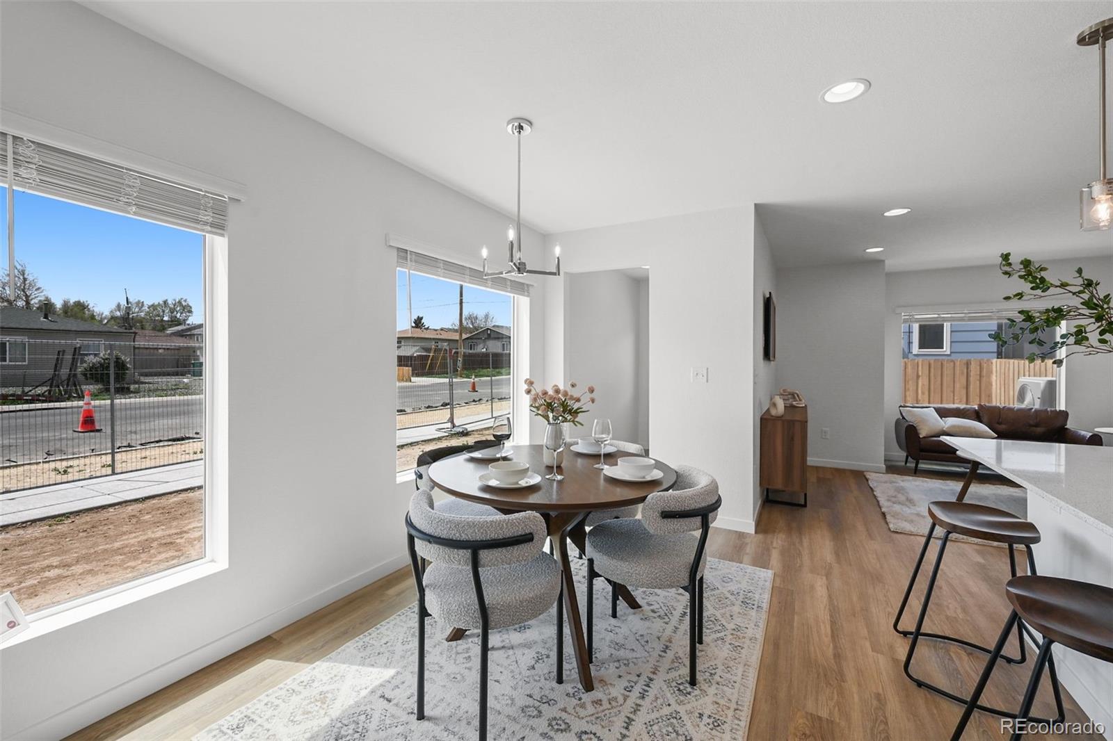 1314 Akron Street Aurora, CO 80010 - Photo 7 of 29 a view of a dining room with furniture window and outside view