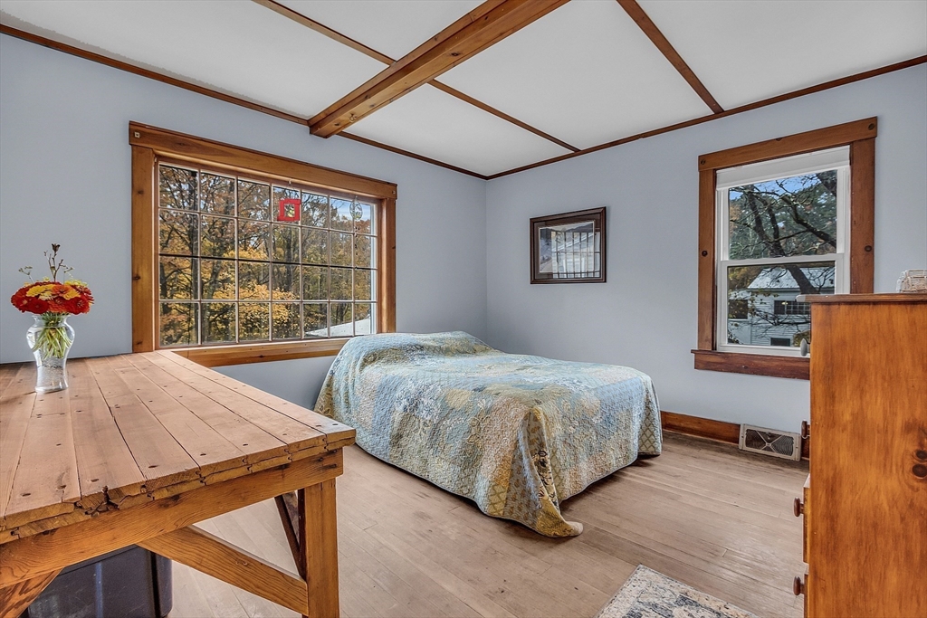 41 Orange Road Warwick, MA 01378 - Photo 13 of 42 a bedroom with a bed and a window