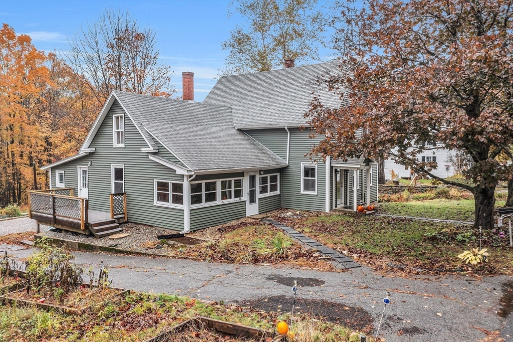 41 Orange Road Warwick, MA 01378 - Photo 33 of 42 front view of a house with a yard