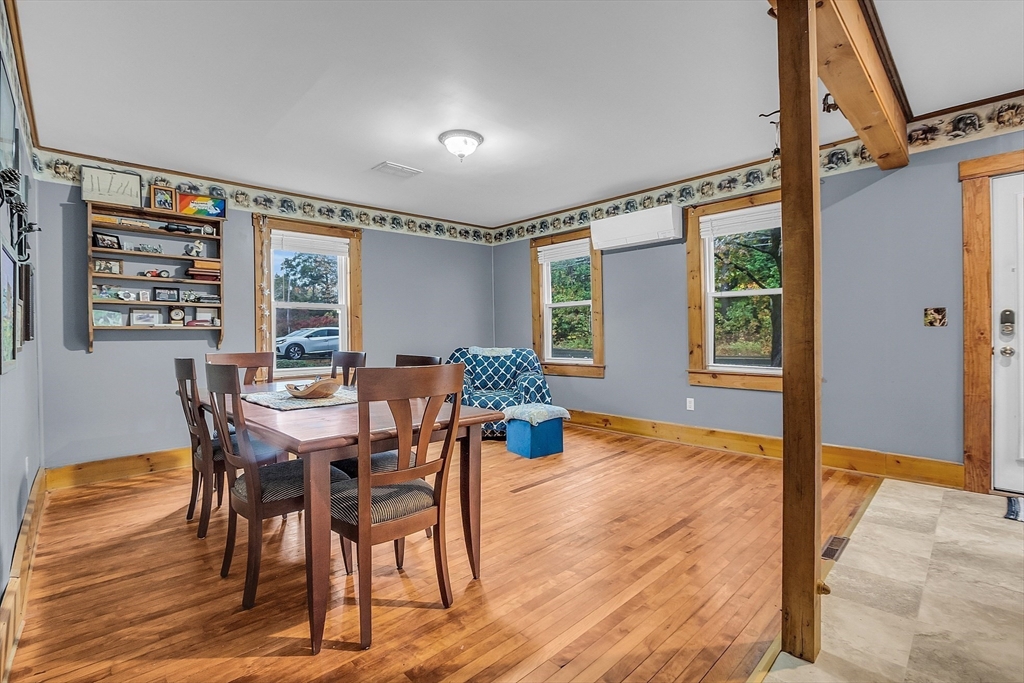 41 Orange Road Warwick, MA 01378 - Photo 8 of 42 a view of a dining room with furniture window and wooden floor