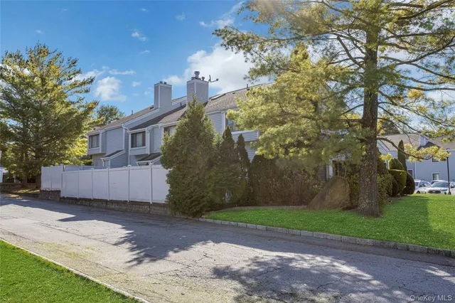 a view of a yard in front of a house