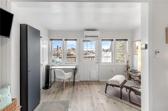 a view of a livingroom with furniture and window