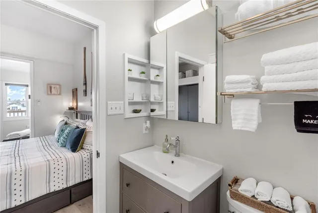 a view of a balcony with furniture