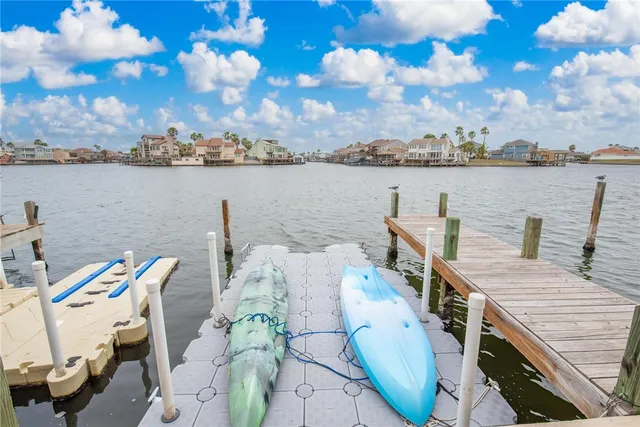 a view of a city with lawn chairs