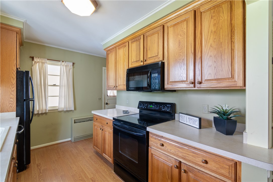6592 Tuckahoe Road Williamson, NY 14589 - Photo 8 of 40 Make MEALS and MEMORIES in the easy to work in kitchen! There are pull outs in the cupboards for easily accessible cookware!