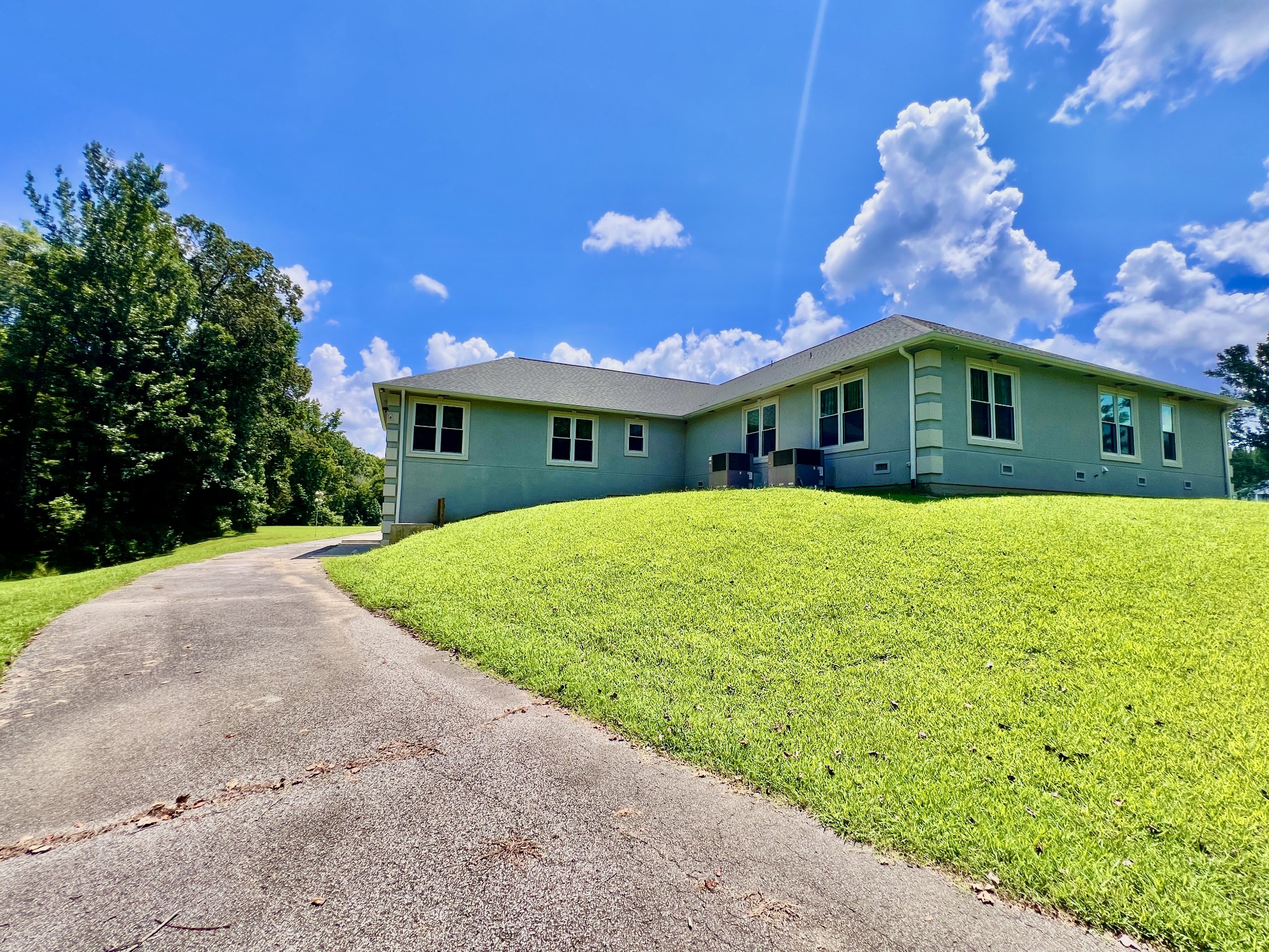 3375 Rowland Mill Road Buena Vista, TN 38318 - Photo 19 of 85 a view of a house with a yard