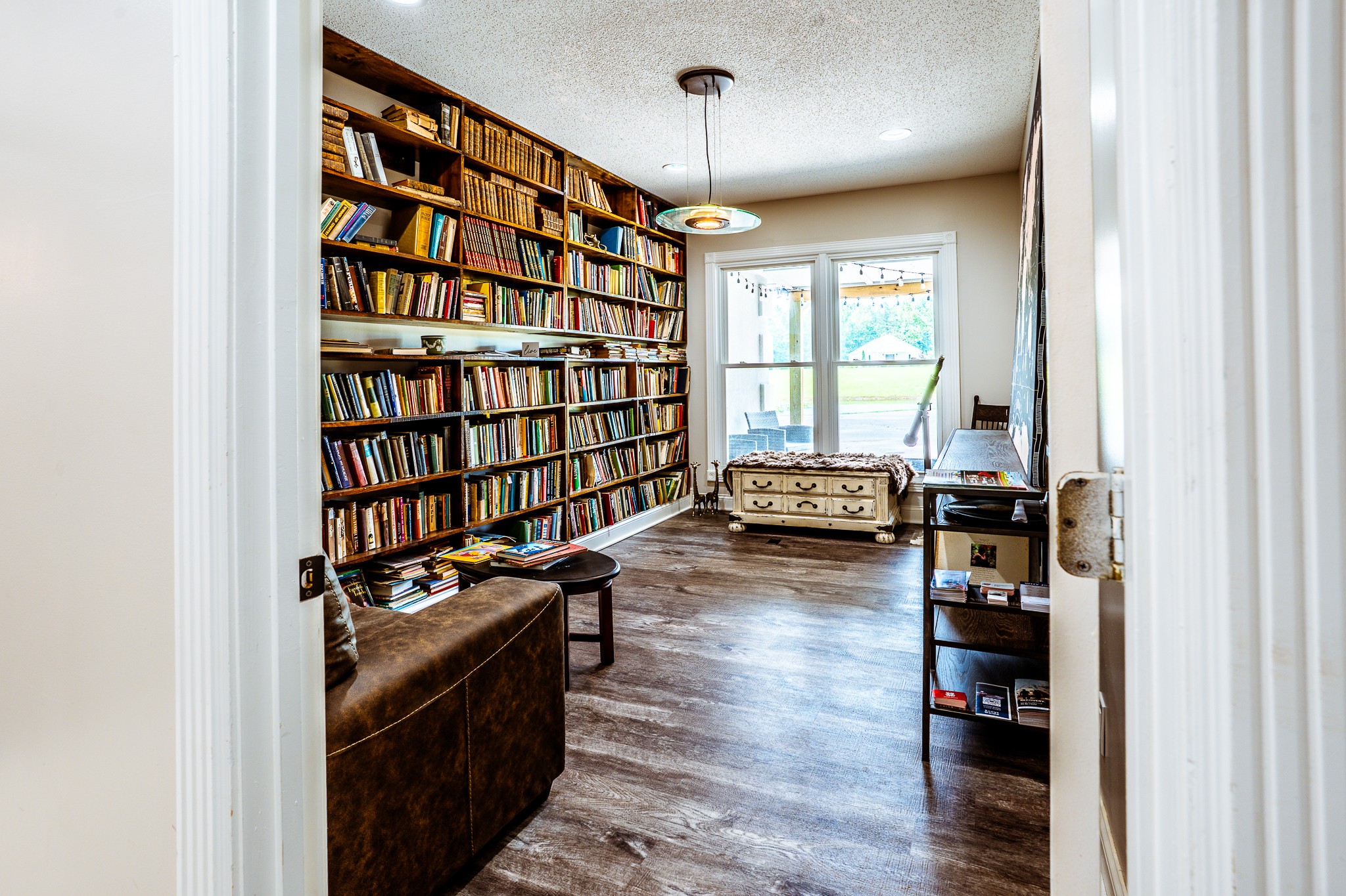 3375 Rowland Mill Road Buena Vista, TN 38318 - Photo 22 of 85 a living room with furniture a book shelf and a book shelf