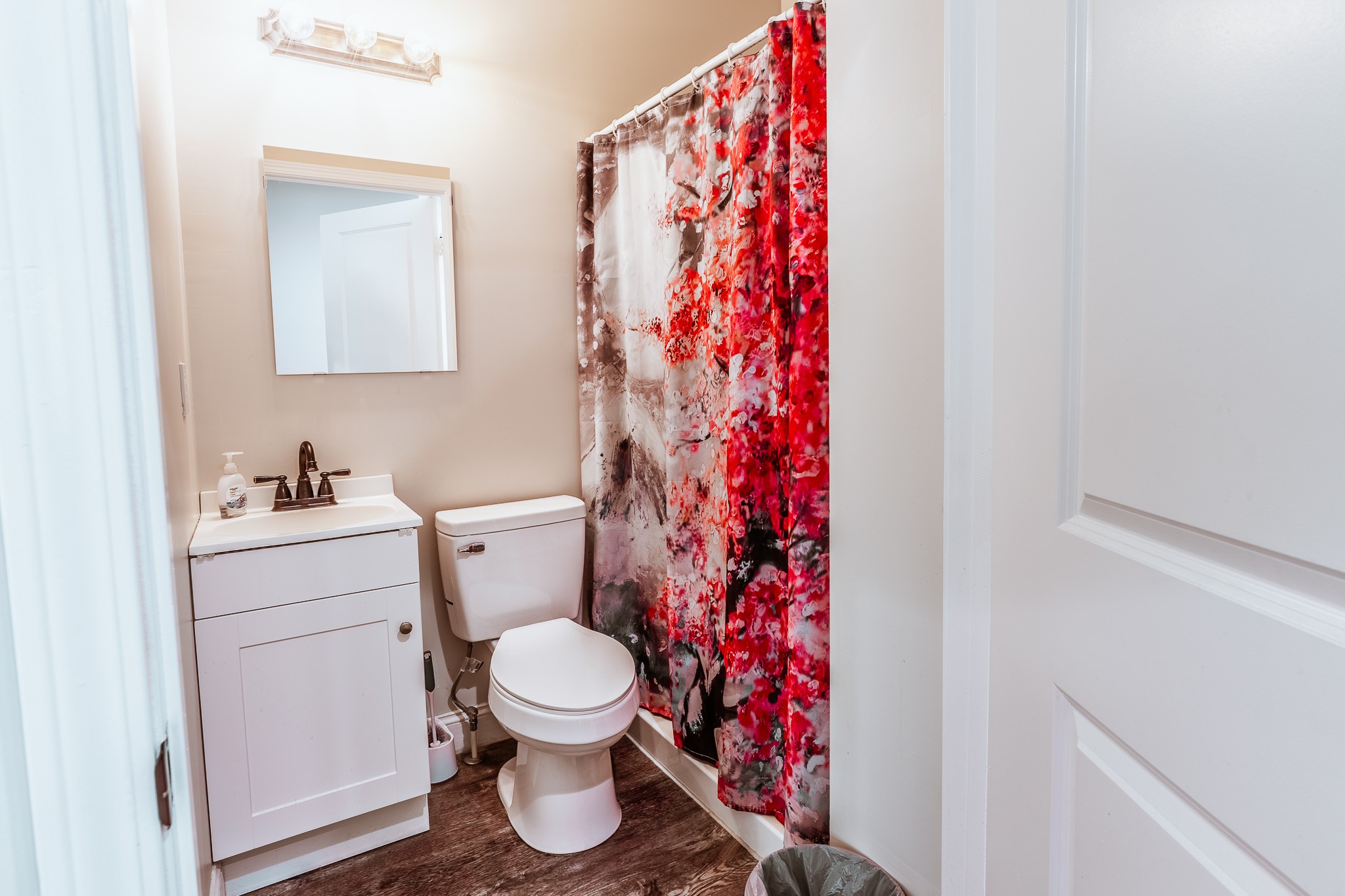 3375 Rowland Mill Road Buena Vista, TN 38318 - Photo 37 of 85 a bathroom with a toilet and shower curtain