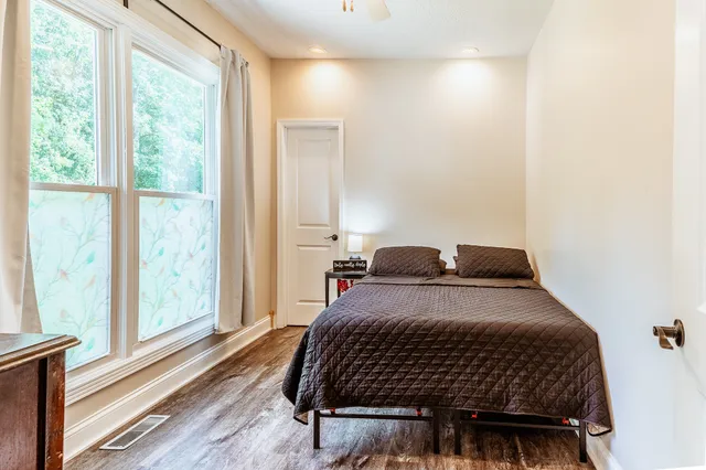 a house with trees in the background