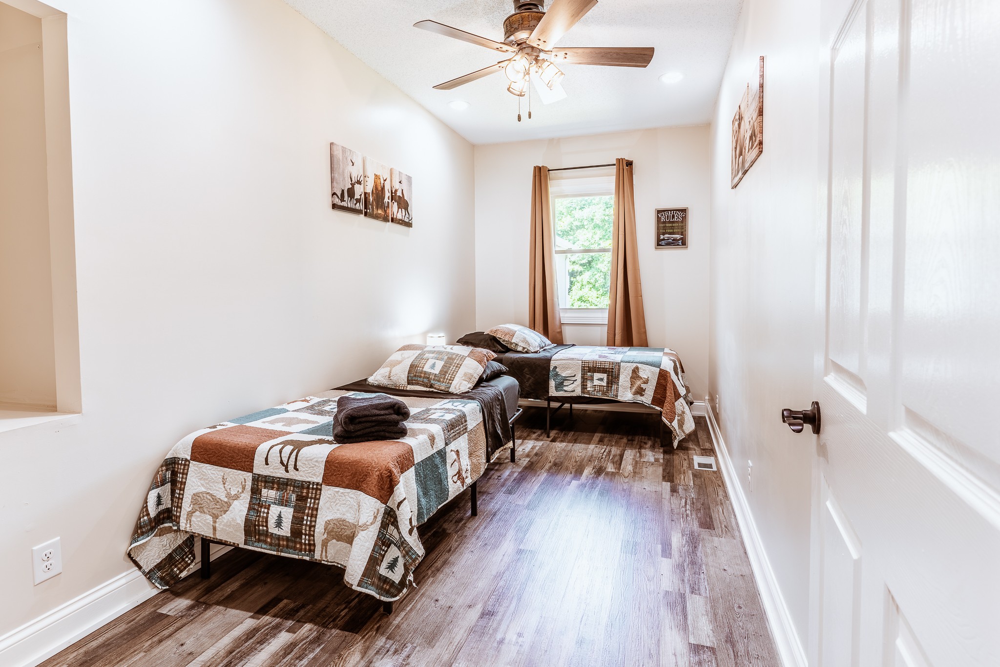 3375 Rowland Mill Road Buena Vista, TN 38318 - Photo 46 of 85 a bedroom with a bed and wooden floor